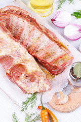 Fresh pork ribs, marinated meat prepared for roast
