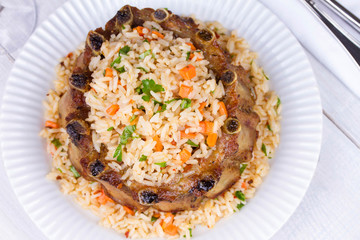Grilled pork ribs with rice and spices