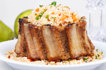 Grilled pork ribs with rice and spices
