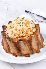 Grilled pork ribs with rice and spices