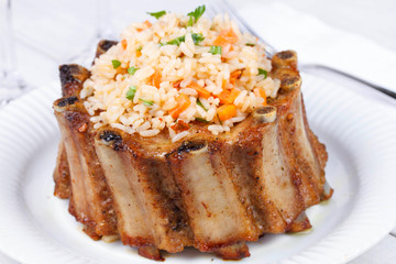 Grilled pork ribs with rice and spices