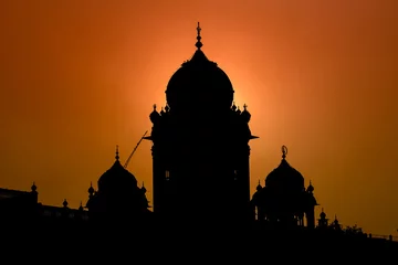 Foto op Plexiglas Silhouette Temple in Amritsar, India at sunset © OlegD