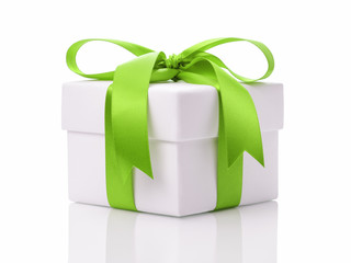 white gift box with green ribbon bow