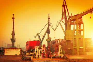 Cranes in historical shipyard in Gdansk, Poland - obrazy, fototapety, plakaty