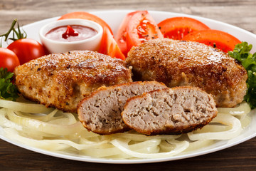 Fried chops and vegetable salad