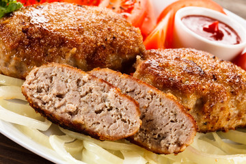 Fried chops and vegetable salad