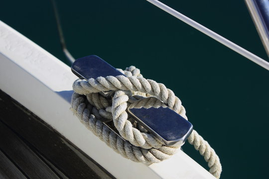 rope tied on stainless steel sail boat cleat
