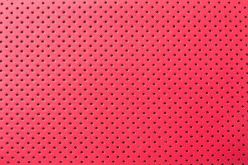 Red leather texture with perforated holes