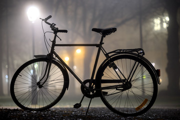 Fototapeta na wymiar Silhouette of parked bicycle