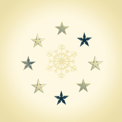 Snowflake surrounded by gold and silver stars