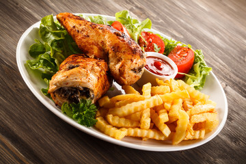 Grilled chicken fillets and vegetables