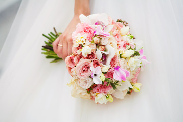 bride holding the wedding bouquet