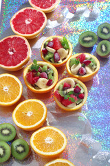 Orange bowl with colorful fruit salad