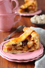 Slice of homemade  traditional dutch apple cake, appeltaart