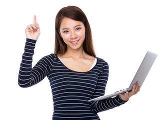Woman use of laptop and finger point up