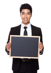 Businessman show with chalkboard