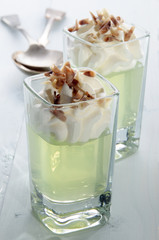 woodruff jelly with whipped cream and chocolate curls