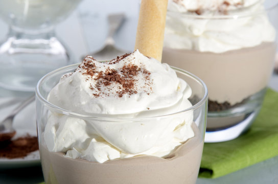 Mocca Cream Dessert With Whipped Cream And Cocoa Powder