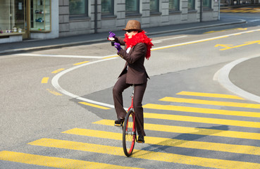 portrait of businesswoman with unicycle © alexandre zveiger