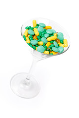 Supplements in the glass, isolated. Healthcare concept.