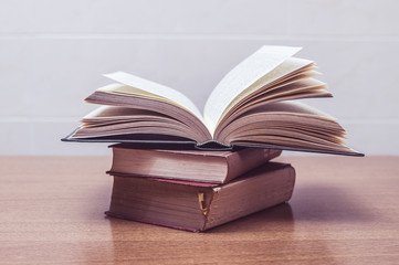 Some old books on a table