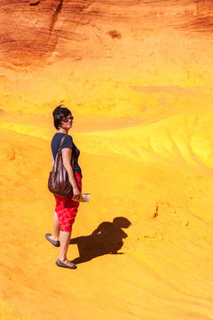 Woman in ocher fraction of Roussillon