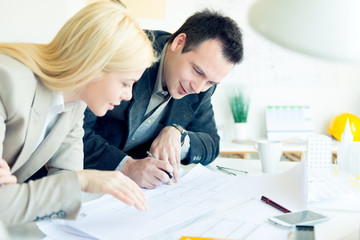 Young architects working at office