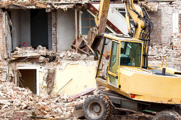 House demolition with excavator