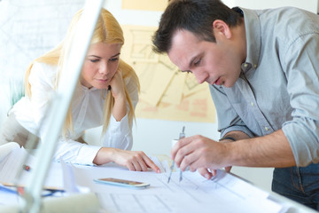 Young architects working at office