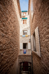 view of old narrow street at mediterranean city