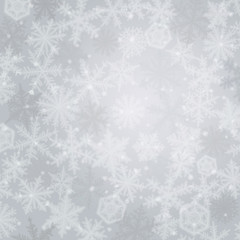 Fototapeta na wymiar Light winter background made from snowflakes
