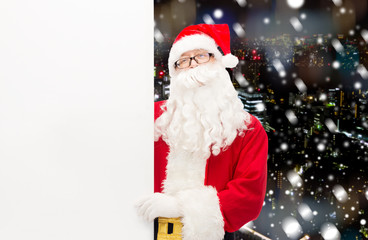 man in costume of santa claus with billboard