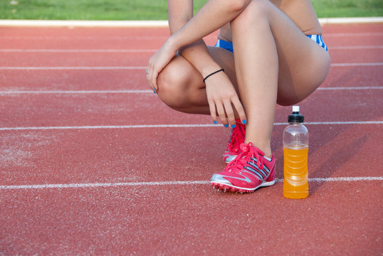 Energy drink bottle , athletic fitness runner girl