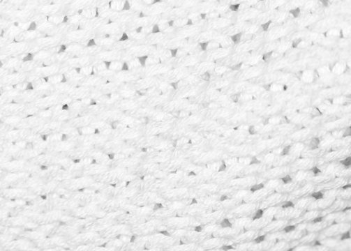background from white knitted fabric