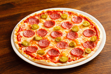 pizza on wood background