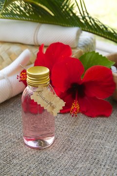 A bottle of hibiscus shampoo.