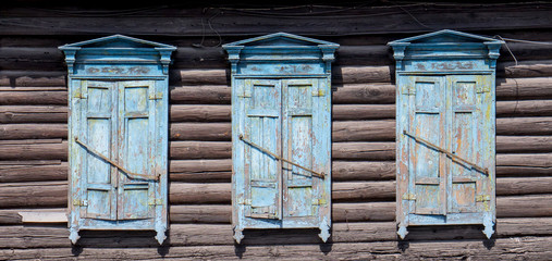 Fototapeta na wymiar Wooden window with shutter doors.
