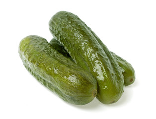 Pickled cucumbers on white background