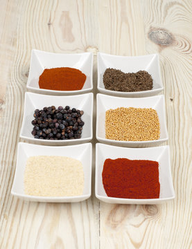 various spices on wooden table