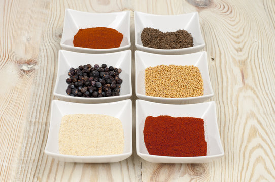 various spices on wooden table