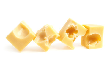 Pieces of cheese isolated on a white background