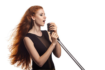 Singing woman with retro microphone.