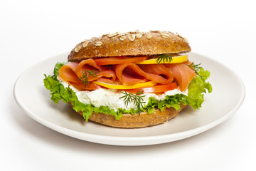 Cream cheese and smoked salmon bagel. Selective focus.