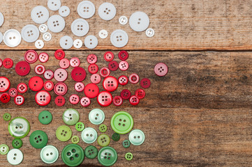 Buttons stack on wooden background