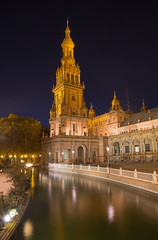 Fototapeta na wymiar Seville - The tower of Plaza de Espana square