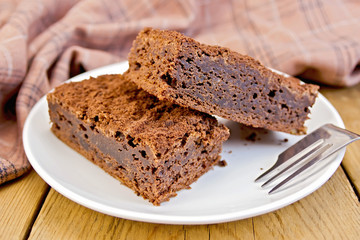 Pie chocolate in plate on board