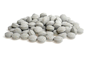 Fototapeta na wymiar Natural herbal pills isolated on white background