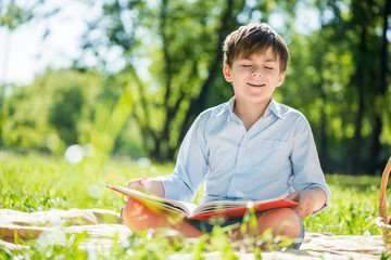 Boy in summer park