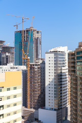 Modern office buildings and hotels are under construction