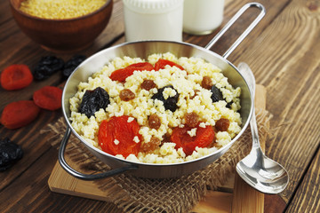 Millet porridge with dried fruit